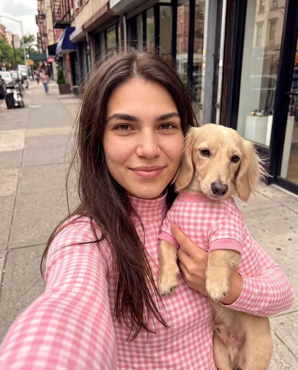 Pet brand feed post: dachshund in pink gingham set, corner shop selfie